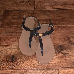Black Aldo sandals with gold buckles